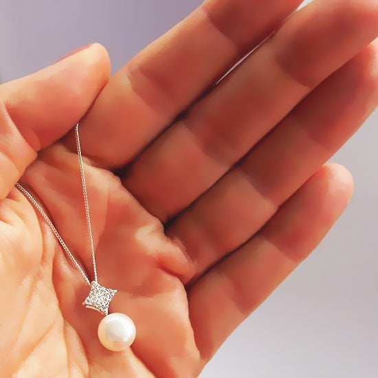 White Pearl Pendant with Diamond Shaped Cubic Zirconia