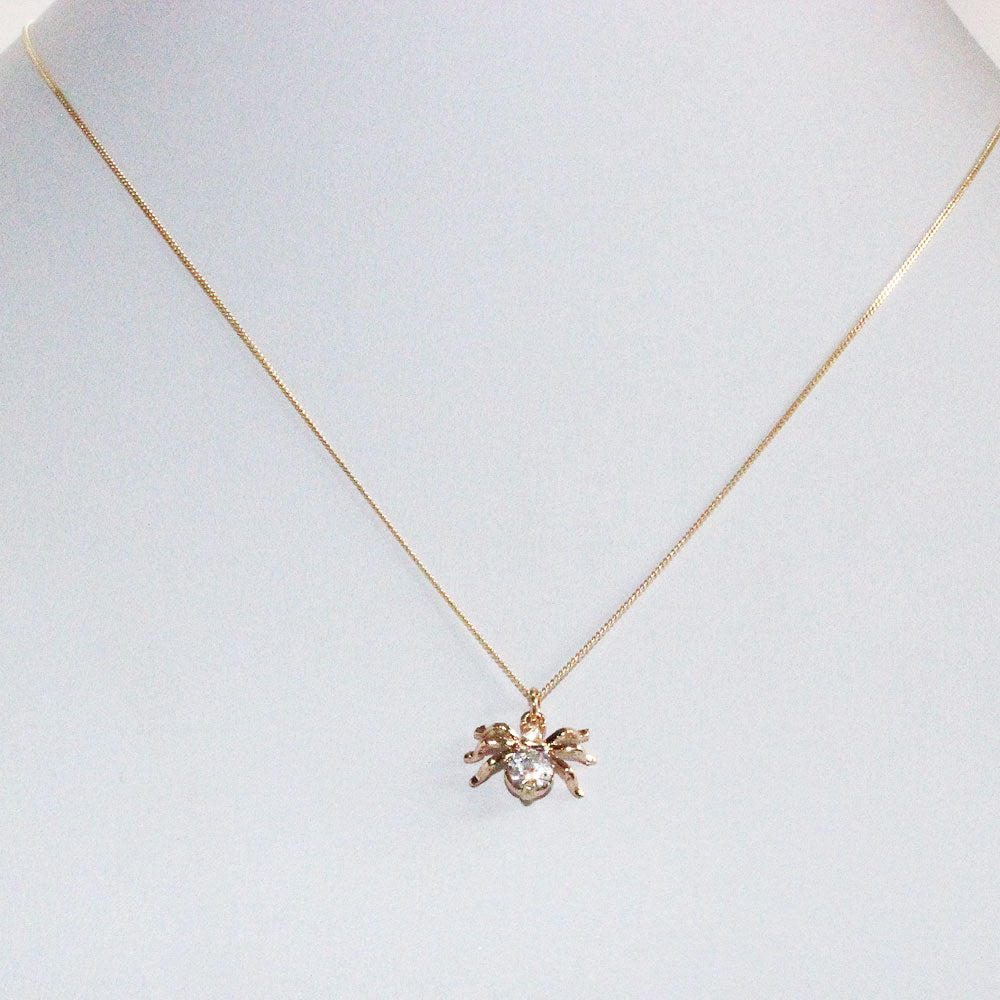 golden crystal spider necklace