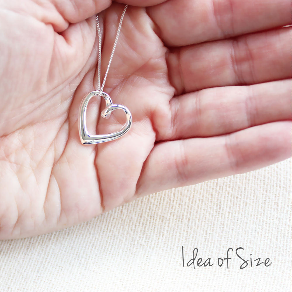 Every Love Story Curled Silver Heart Pendant