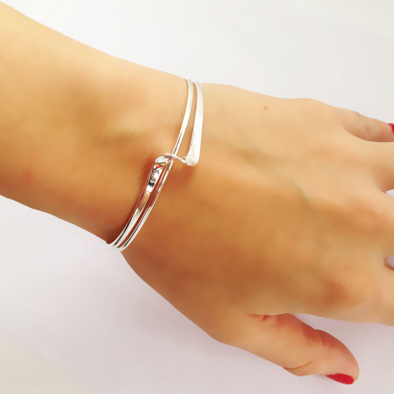 Rosa Twist Torque Silver Bangle