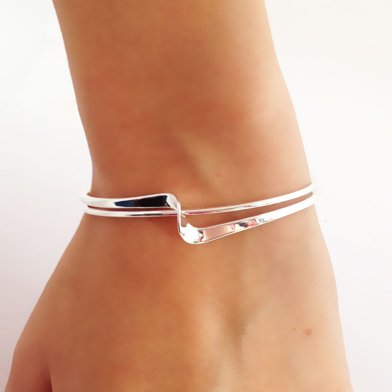 Rosa Twist Torque Silver Bangle