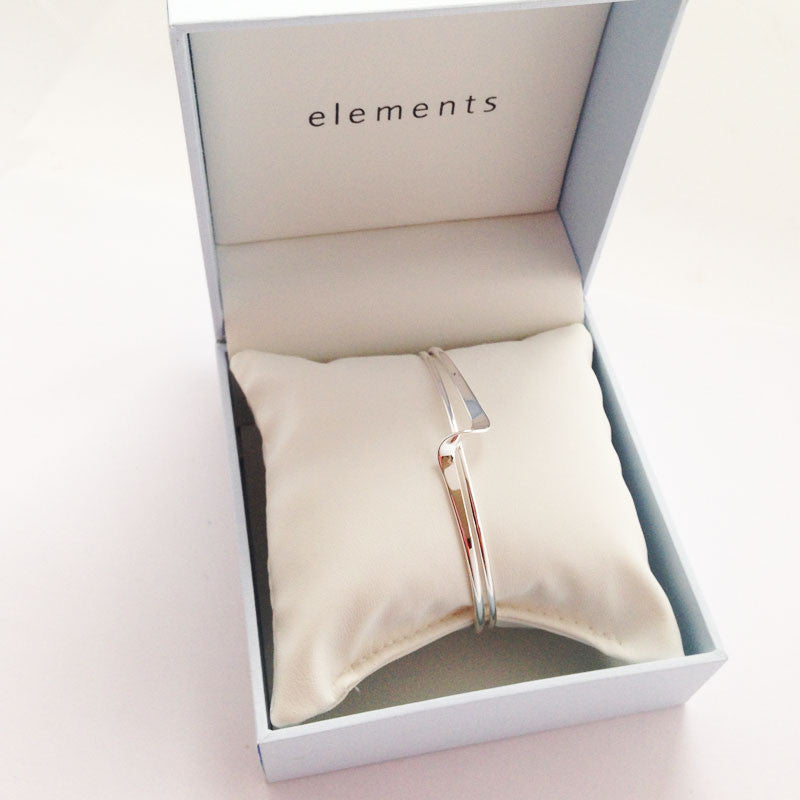Rosa Twist Torque Silver Bangle