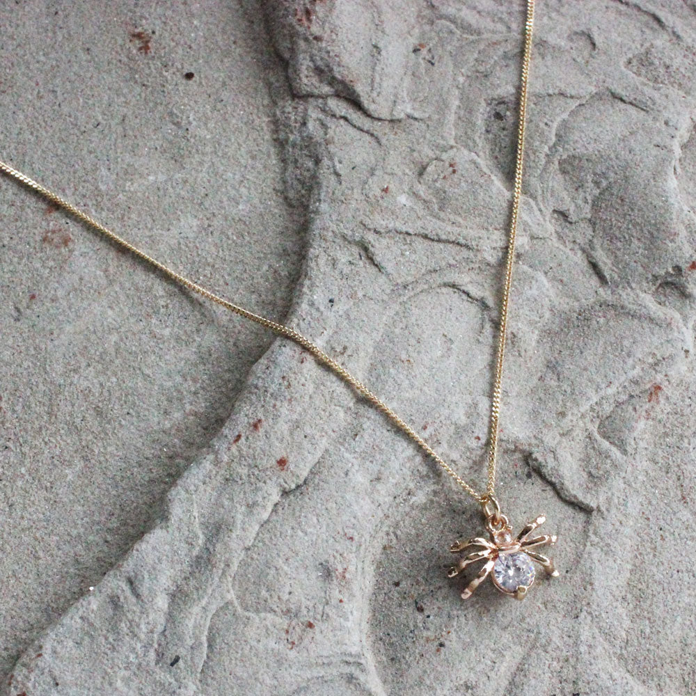 golden crystal spider necklace