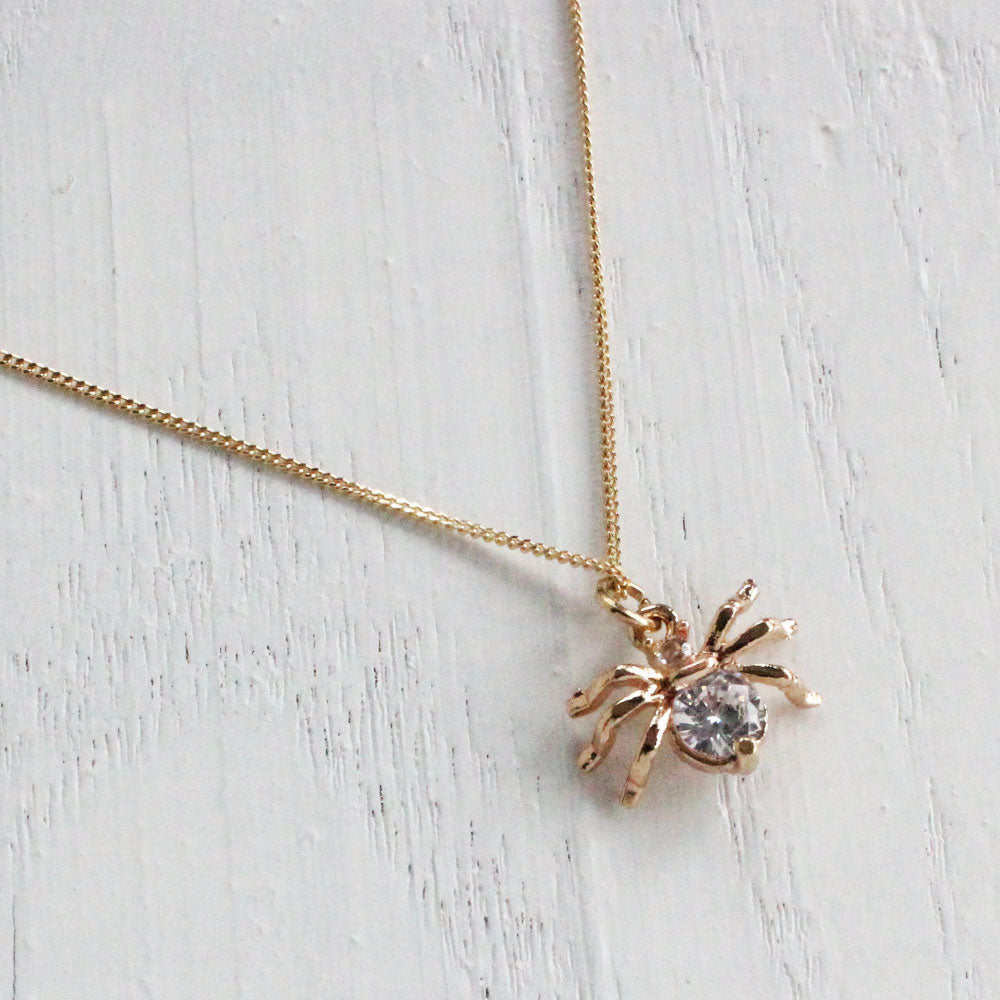 golden crystal spider necklace